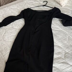 Black backless, long sleeve midi dress from Lulu’s